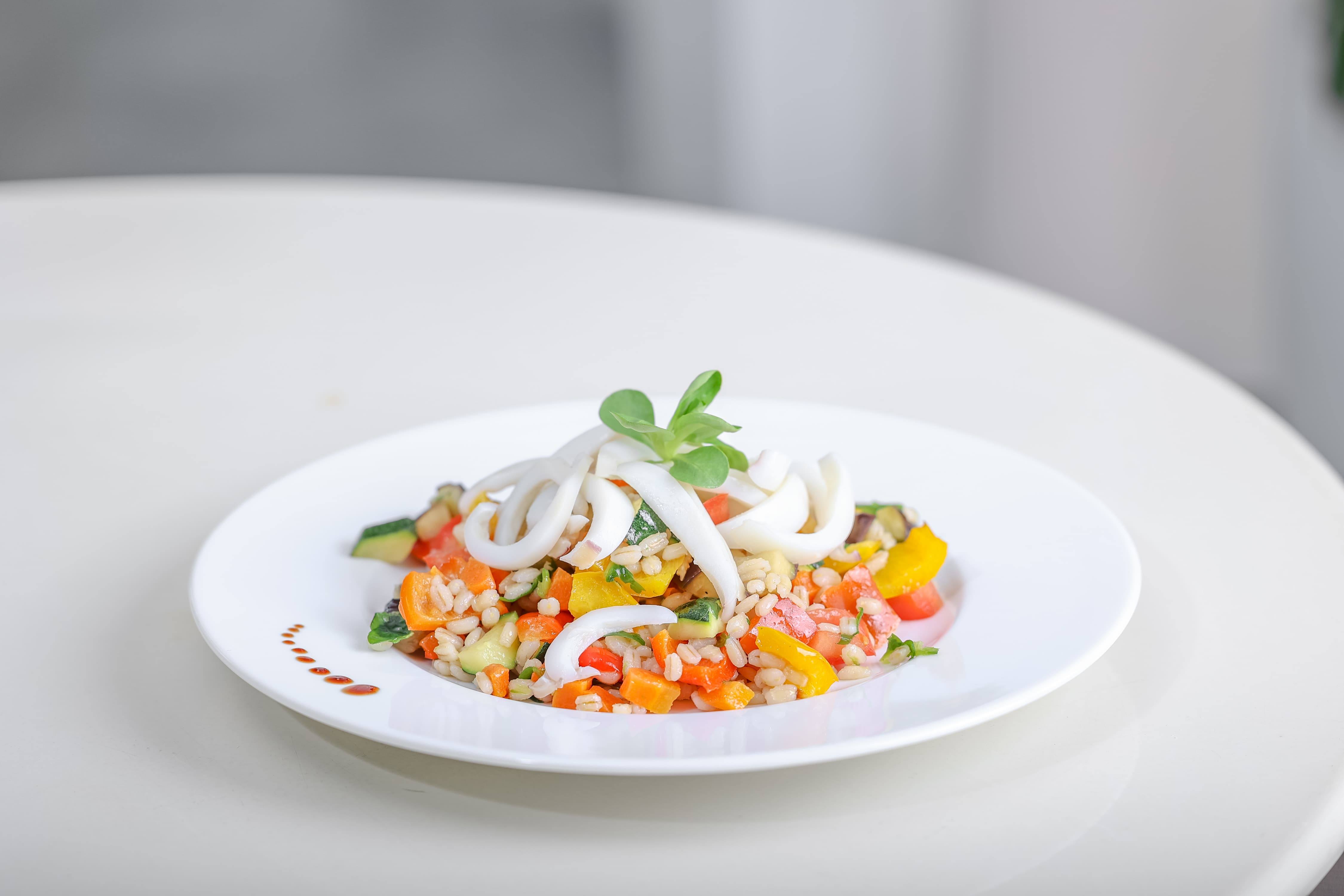 Piatto di pesce fresco del ristorante dell'Hotel Rosanna